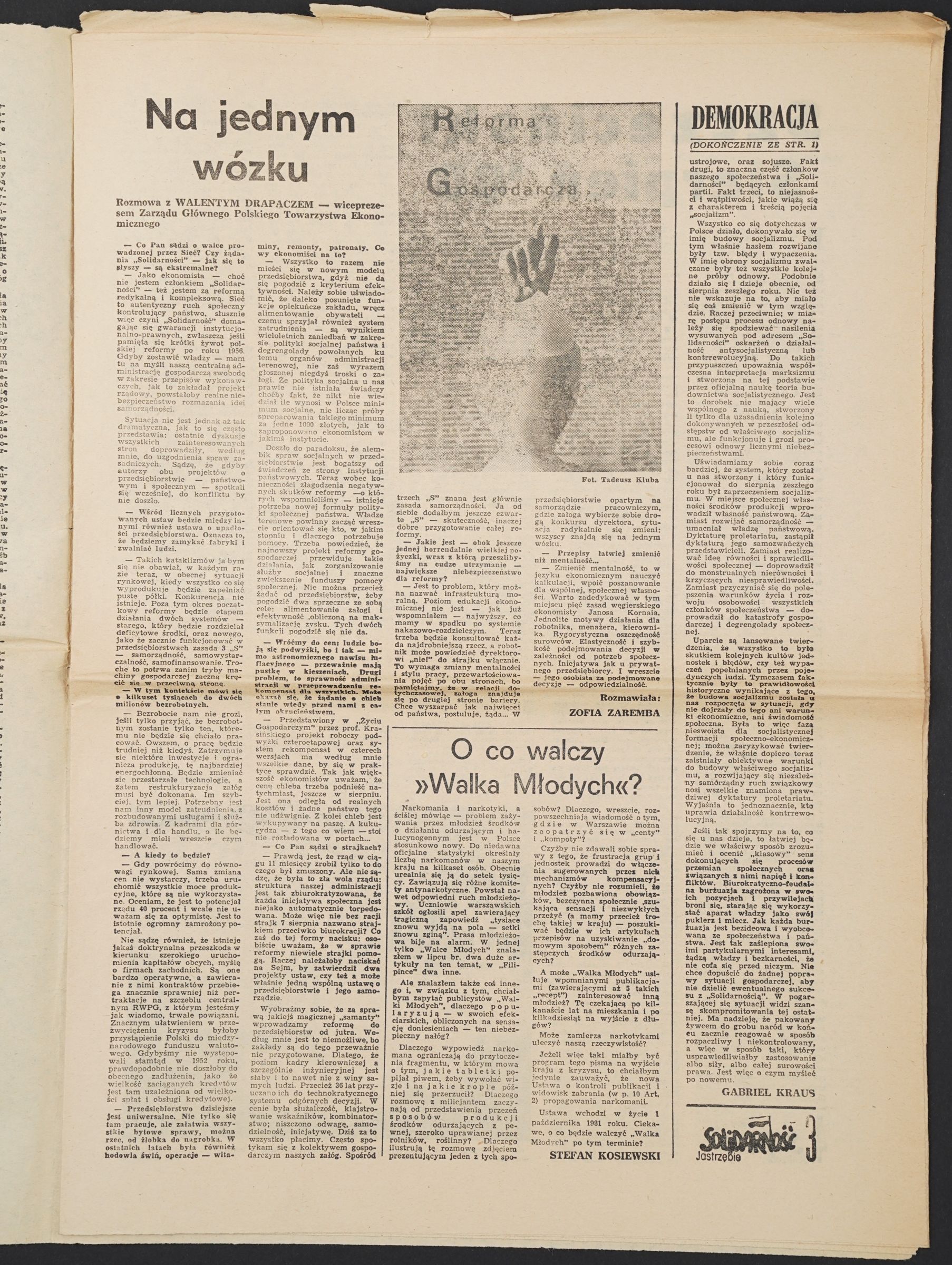 Strona z rozmową „Na jednym wózku” i grafiką „Reforma Gospodarcza”.